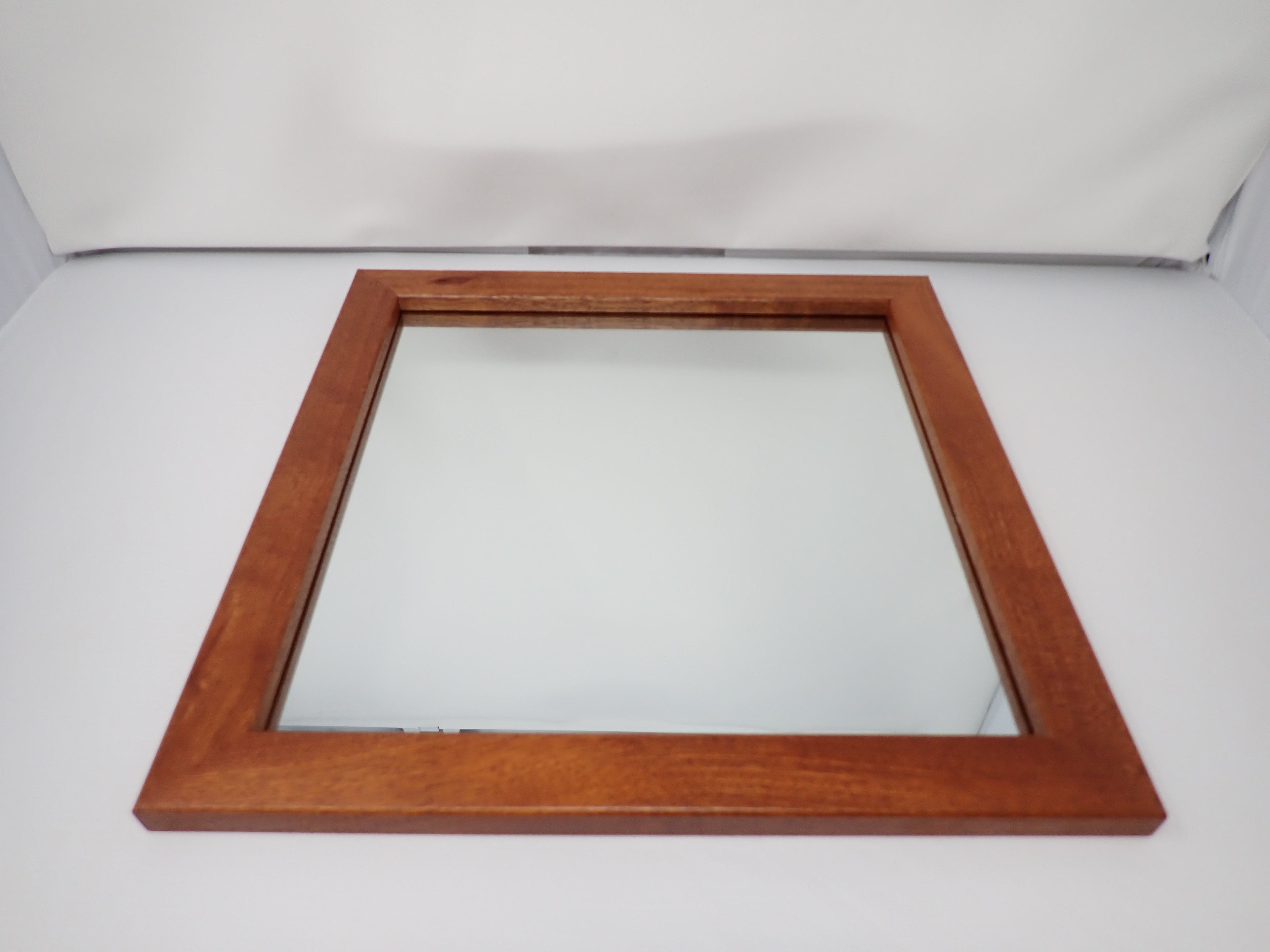 Mirror with Minimalist Ribbon Sawn Sapele Frame